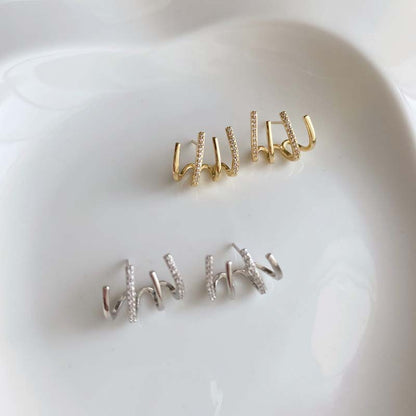 European and American fashion retro zircon four-claw earrings high-grade temperament simple zircon female silver pin earrings flash earrings
