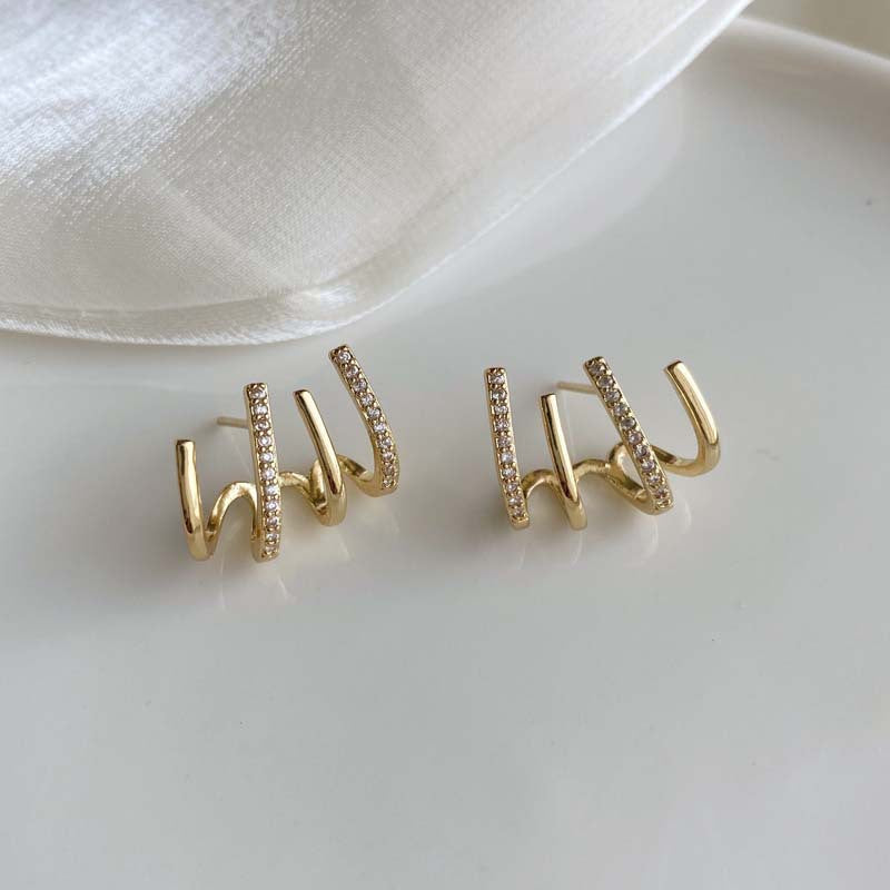 European and American fashion retro zircon four-claw earrings high-grade temperament simple zircon female silver pin earrings flash earrings