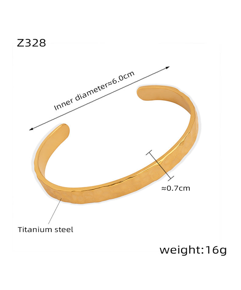 New simple personality niche design titanium steel gold-plated irregular bump hammer face opening bracelet women's jewelry wholesale