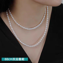 Multi-layer stacked Shijia pearl sweater chain long necklace women's round strong light Joker feeling autumn and winter accessories manufacturers batch