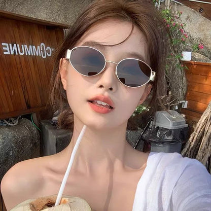Cross-border New Arc de Triomphe Oval Metal Small Frame Sunglasses Women's High-end Fashion Street Photograph Sunglasses Sunglasses