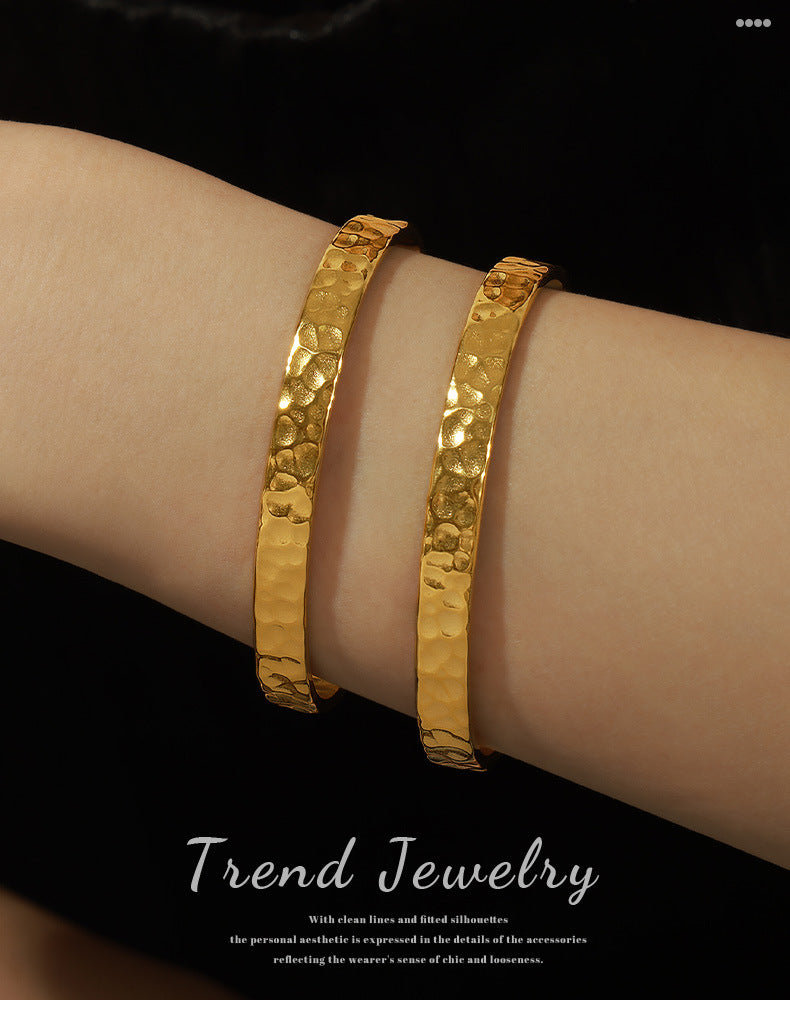 New simple personality niche design titanium steel gold-plated irregular bump hammer face opening bracelet women's jewelry wholesale