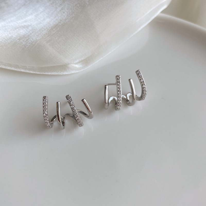European and American fashion retro zircon four-claw earrings high-grade temperament simple zircon female silver pin earrings flash earrings