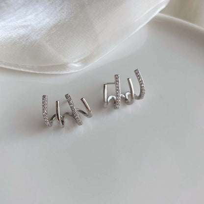 European and American fashion retro zircon four-claw earrings high-grade temperament simple zircon female silver pin earrings flash earrings