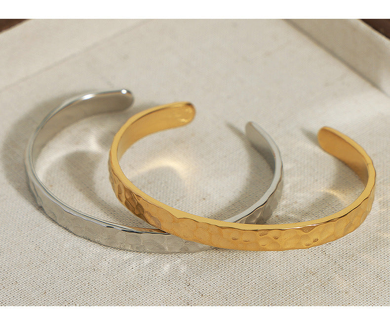 New simple personality niche design titanium steel gold-plated irregular bump hammer face opening bracelet women's jewelry wholesale