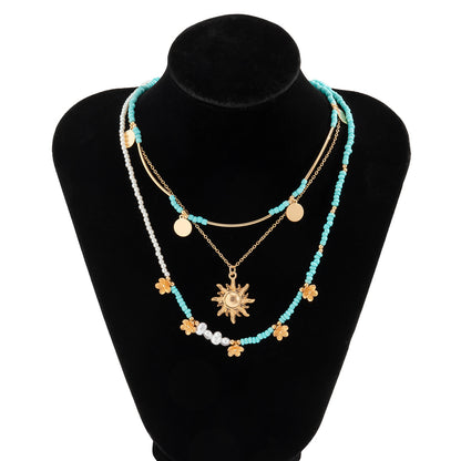All-match Rice Bead Sequins Tassel Sunflower Pendant Retro Clavicle Necklace European and American Hip Hop Imitation Pearl Niche Necklace