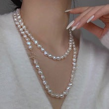 Multi-layer stacked Shijia pearl sweater chain long necklace women's round strong light Joker feeling autumn and winter accessories manufacturers batch