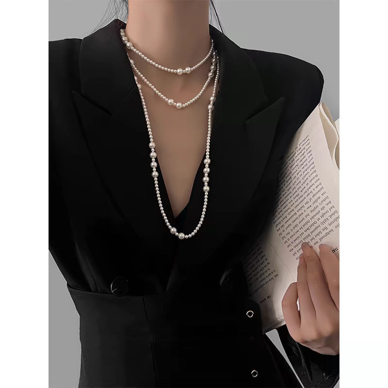 Multi-layer stacked Shijia pearl sweater chain long necklace women's round strong light Joker feeling autumn and winter accessories manufacturers batch