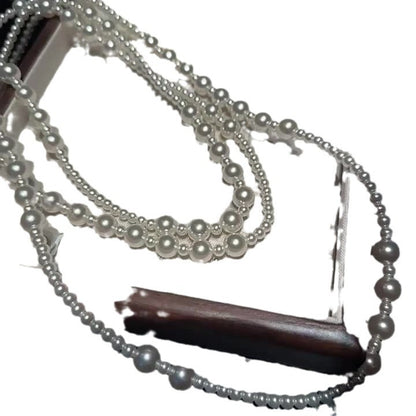Multi-layer stacked Shijia pearl sweater chain long necklace women's round strong light Joker feeling autumn and winter accessories manufacturers batch