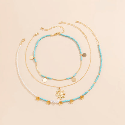 All-match Rice Bead Sequins Tassel Sunflower Pendant Retro Clavicle Necklace European and American Hip Hop Imitation Pearl Niche Necklace