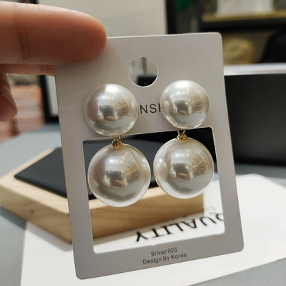 South Korea Dongdaemun Spring New exaggerated retro big pearl stud earrings cold style elegant female silver needle earrings wholesale