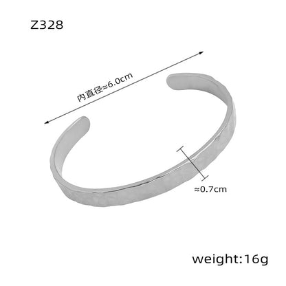 New simple personality niche design titanium steel gold-plated irregular bump hammer face opening bracelet women's jewelry wholesale