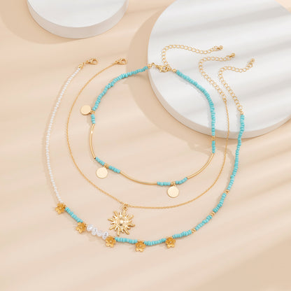 All-match Rice Bead Sequins Tassel Sunflower Pendant Retro Clavicle Necklace European and American Hip Hop Imitation Pearl Niche Necklace