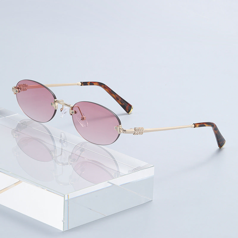 2026 New Oval Rimless Sunglasses European and American Retro Sunglasses Trendy Concave Shape Fashion Street Style Sunglasses