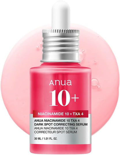 Anua 10+ niacinamide serum bottle with pink background