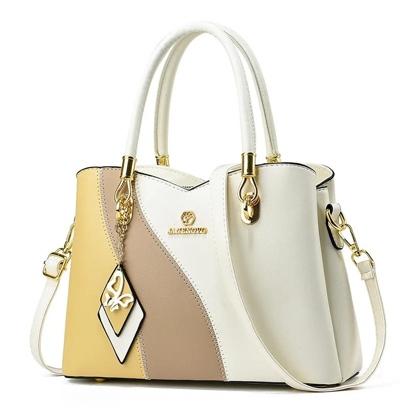 Elegant tri-color women's handbag in white, beige, and tan with gold-tone hardware
